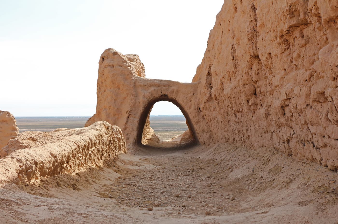 An arched passage through the eroded walls of Ayaz-Kala 1