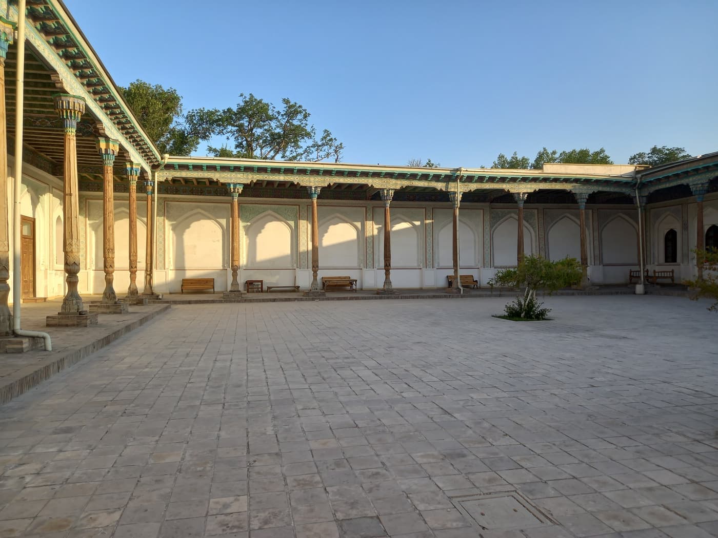 An inner courtyard of the palace with a gallery on slender wooden columns