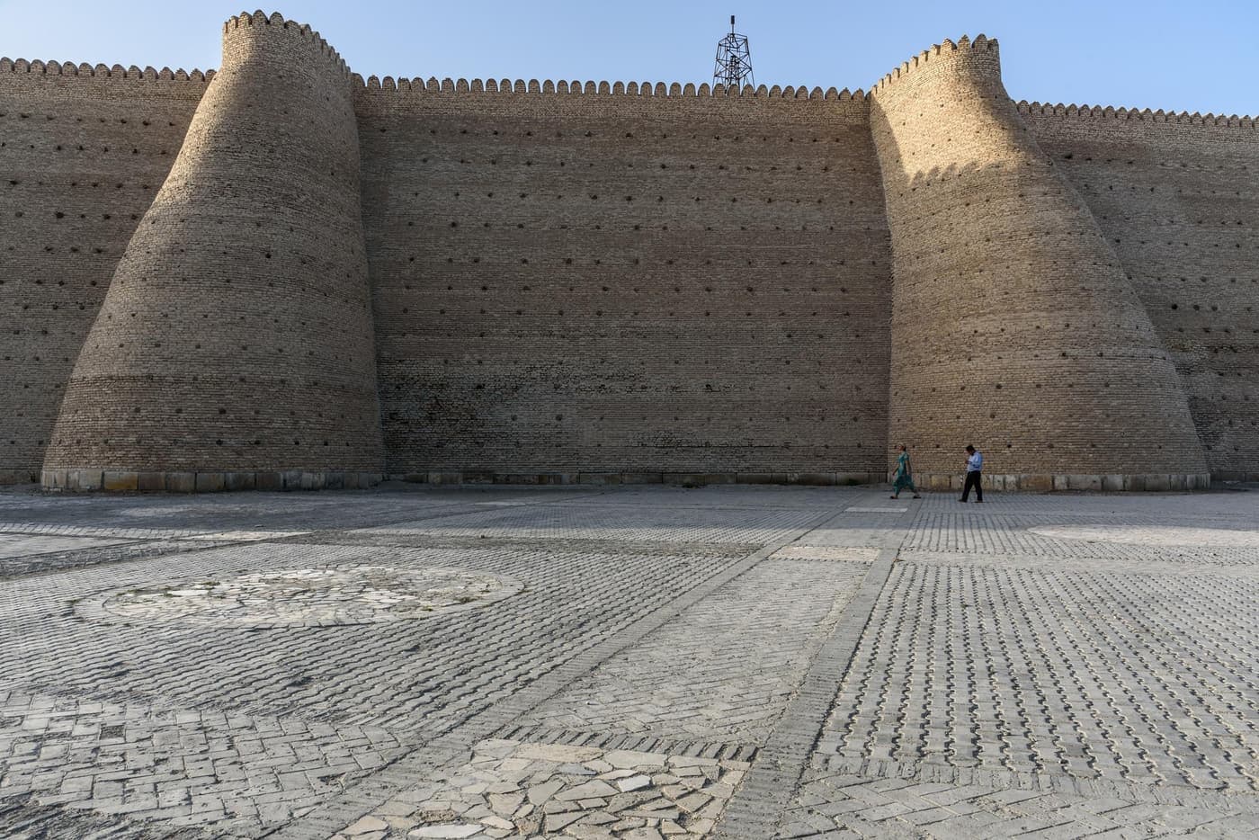 The paved square below the fortress walls